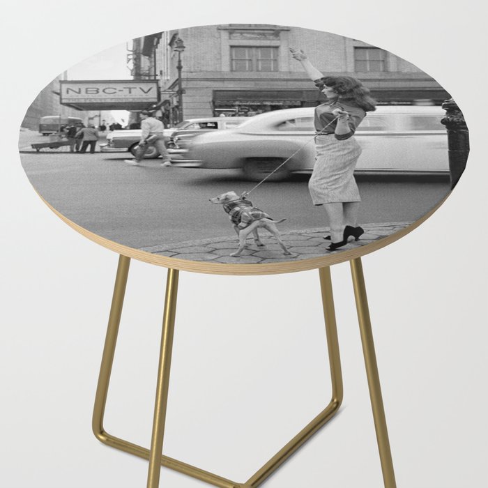Young woman with pet dog hailing a yellow cab taxi New York City portrait black and white photograph - photography - photographs Side Table Gallery Image 2