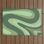 Retro Liquid Swirls Abstract Pattern in Basil and Mint Green Outdoor Rug Gallery Image 1