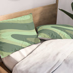 Retro Liquid Swirls Abstract Pattern in Basil and Mint Green Pillow Sham Gallery Image 2