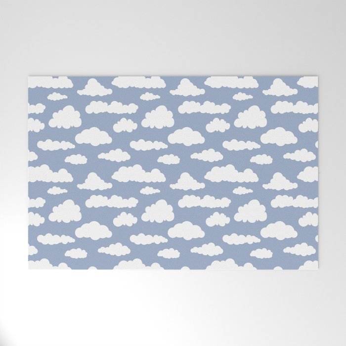 Sunny Summer Sky: White Cartoon Clouds in a Blue Sky Pattern Welcome Mat Gallery Image 1