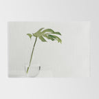 Single Monstera Leaf In Clear Glass Zen Minimalist House Plant Photo Rug Gallery Image 2