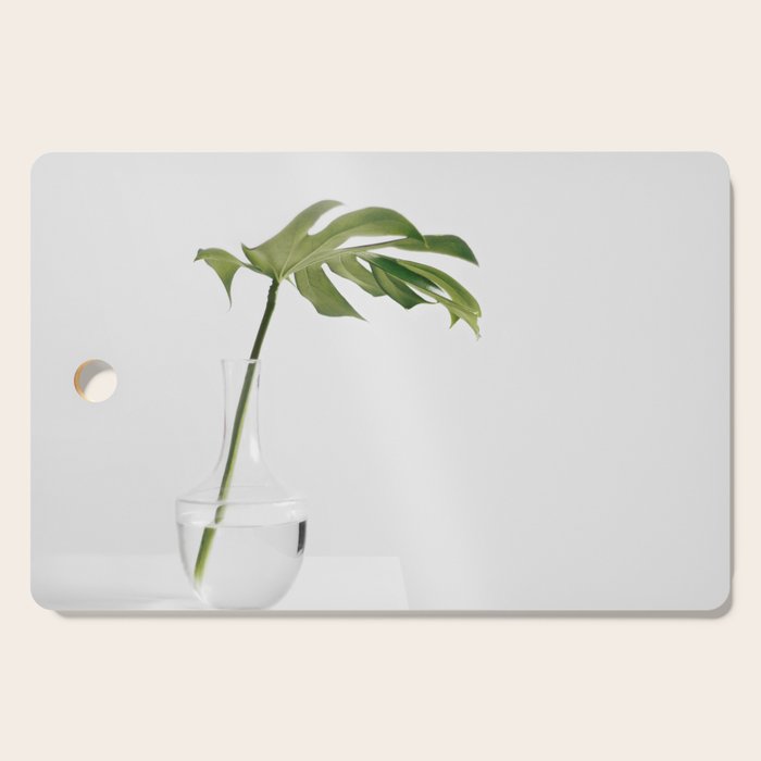 Single Monstera Leaf In Clear Glass Zen Minimalist House Plant Photo Cutting Board Gallery Image 1