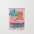One more chapter // pastel pink background orange tabby cat striped mug with plants fuchsia pink and green books  Wall Hanging Gallery Image 1