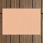 Peachy Apricot Solid Color Outdoor Rug Gallery Image 1