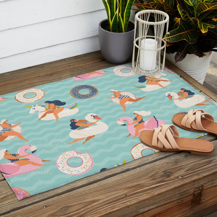 Gils on inflatable in swimming pool floats. Outdoor Rug Gallery Image 2