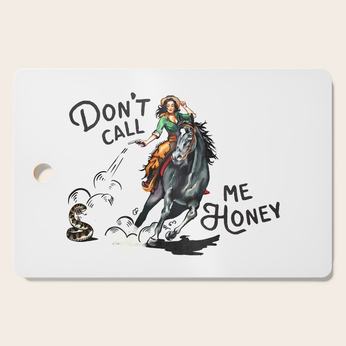 "Don't Call Me Honey" Cowgirl On Horseback Shooting a Rattlesnake Cutting Board Gallery Image 1