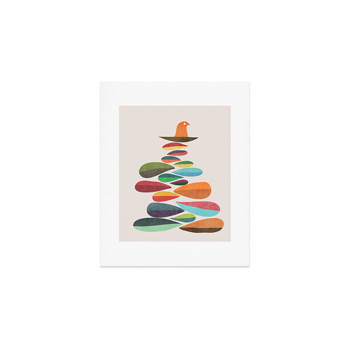 Bird nesting on top of pebbles hill Art Print Gallery Image 1