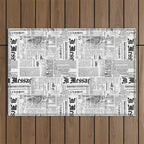 Black And White Collage Of Grunge Newspaper Fragments Outdoor Rug Gallery Image 1