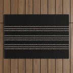 Black and Ivory Ethnic Spotted Striped Outdoor Rug Gallery Image 1