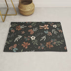 Vintage Winter Foliage with Berries, Pinecones and Ribbons on Black Rug Gallery Image 1