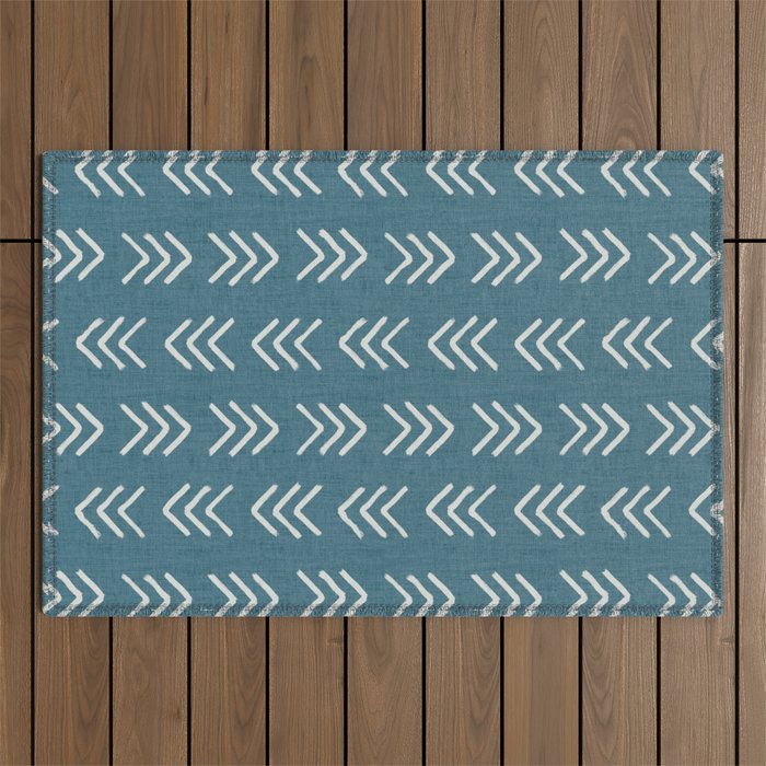 Muted teal and soft white ink brushed arrow heads pattern with textured background Outdoor Rug Gallery Image 1