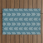 Muted teal and soft white ink brushed arrow heads pattern with textured background Outdoor Rug Gallery Image 1