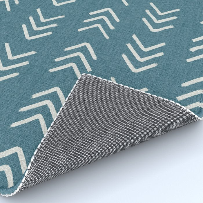 Muted teal and soft white ink brushed arrow heads pattern with textured background Rug Gallery Image 4