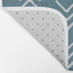 Muted teal and soft white ink brushed arrow heads pattern with textured background Bath Mat Gallery Image 2