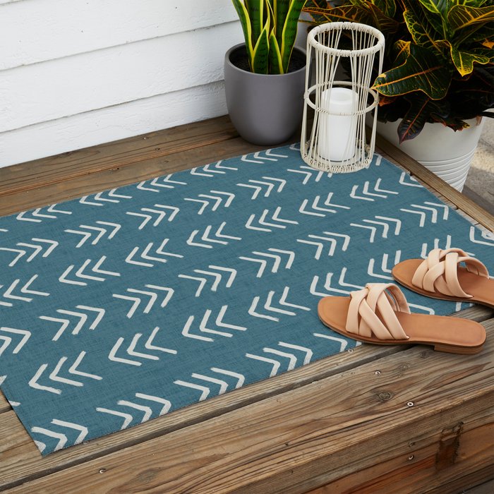 Muted teal and soft white ink brushed arrow heads pattern with textured background Outdoor Rug Gallery Image 2