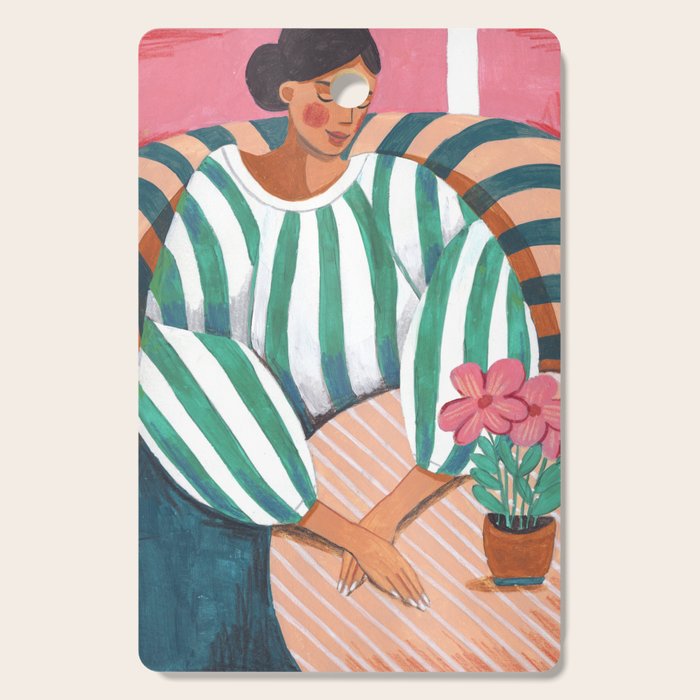 Woman in stripes in thought Cutting Board Gallery Image 1