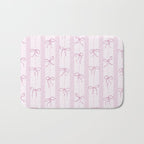 Coquette pink bows on a vertical stripes background Bath Mat Gallery Image 1