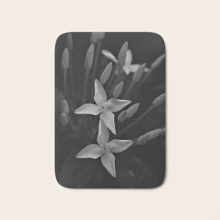 West Indian Jasmine 4-petaled flowers black and white photography / photograph Bath Mat Gallery Image 1