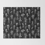 Wildflowers and vases in dark background Throw Blanket Gallery Image 2