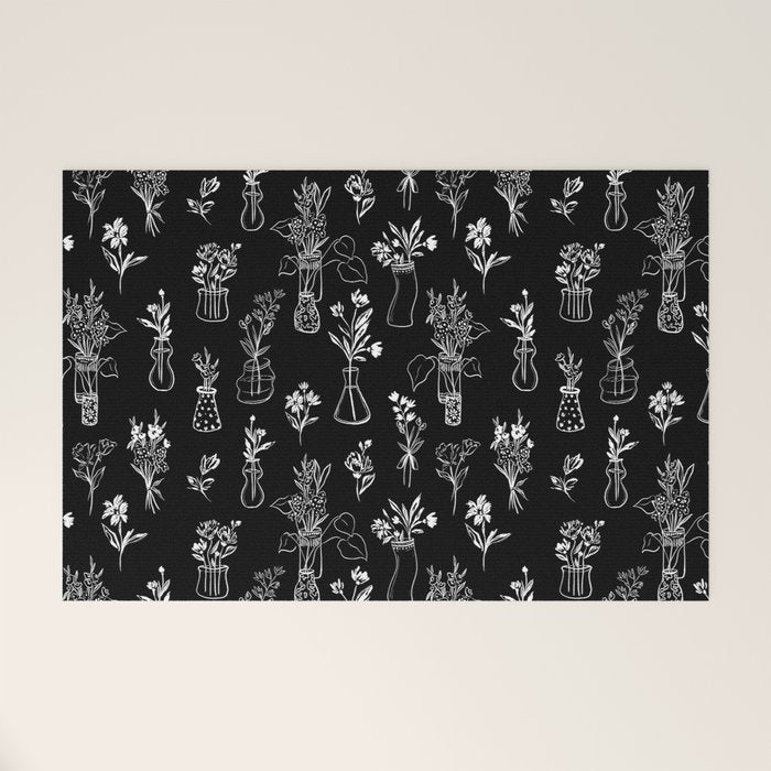 Wildflowers and vases in dark background Welcome Mat Gallery Image 1