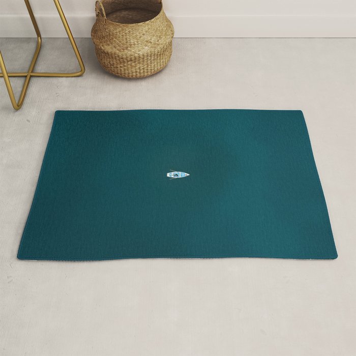 Minimalist Boat in blue Lake  Rug Gallery Image 1