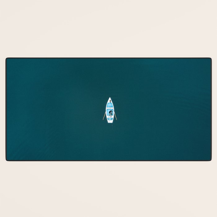 Minimalist Boat in blue Lake  Desk Mat Gallery Image 3