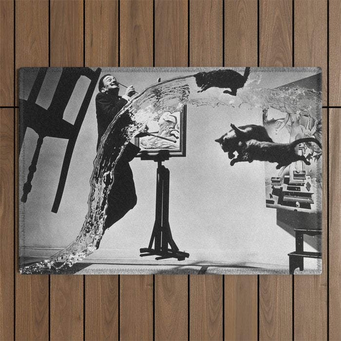 Dalí Atomicus, Salvador Dali painting with flying cats and water spurts surrealism / surrealist black and white photograph / photography by Philippe Halsman Outdoor Rug Gallery Image 1