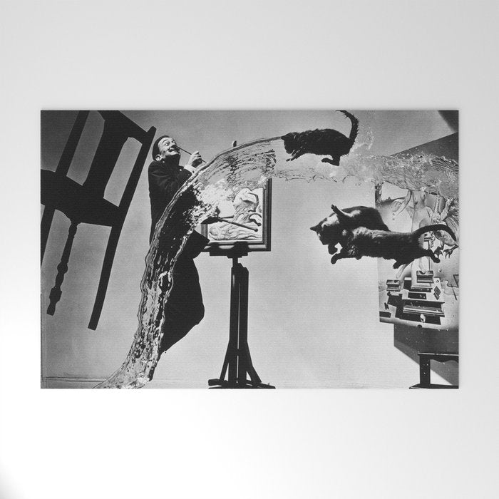 Dalí Atomicus, Salvador Dali painting with flying cats and water spurts surrealism / surrealist black and white photograph / photography by Philippe Halsman Welcome Mat Gallery Image 1