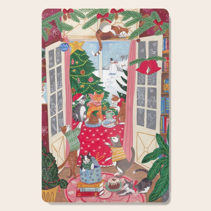Cats in the Window at a Snowy Christmas in Bright Colours Cutting Board Gallery Image 1