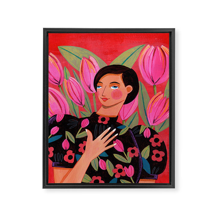 Portrait woman with tulips on red background Framed Canvas Print Gallery Image 1