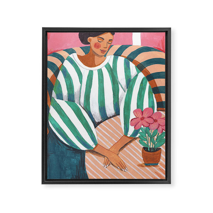 Woman in stripes in thought Framed Canvas Print Gallery Image 1