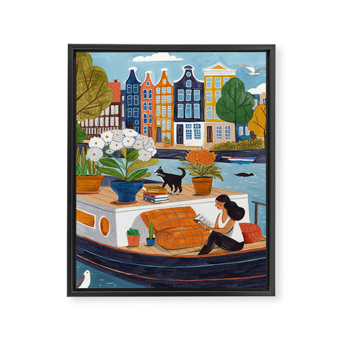 Woman on houseboat in Amsterdam Framed Canvas Print Gallery Image 1