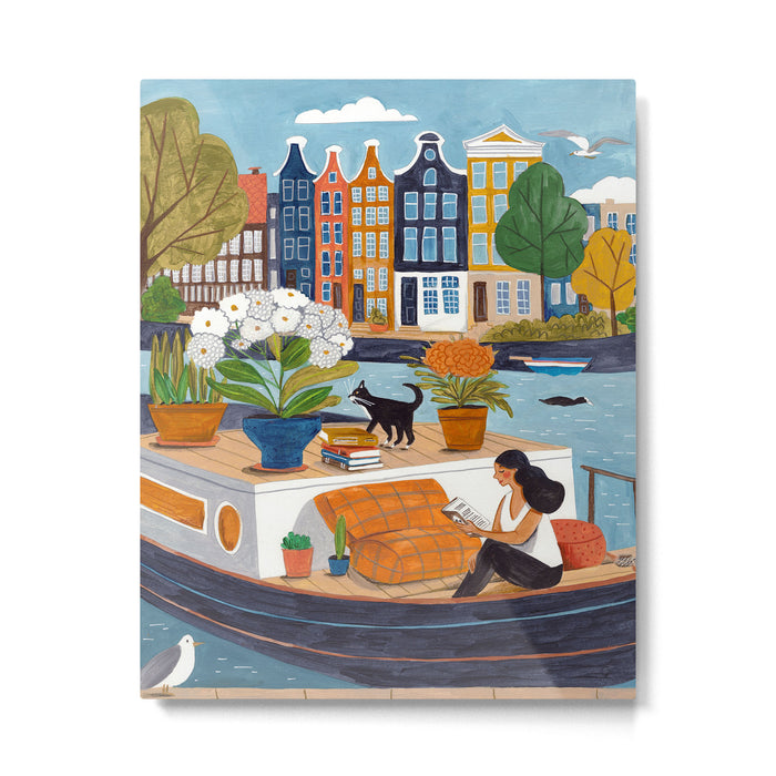Woman on houseboat in Amsterdam Metal Print Gallery Image 1