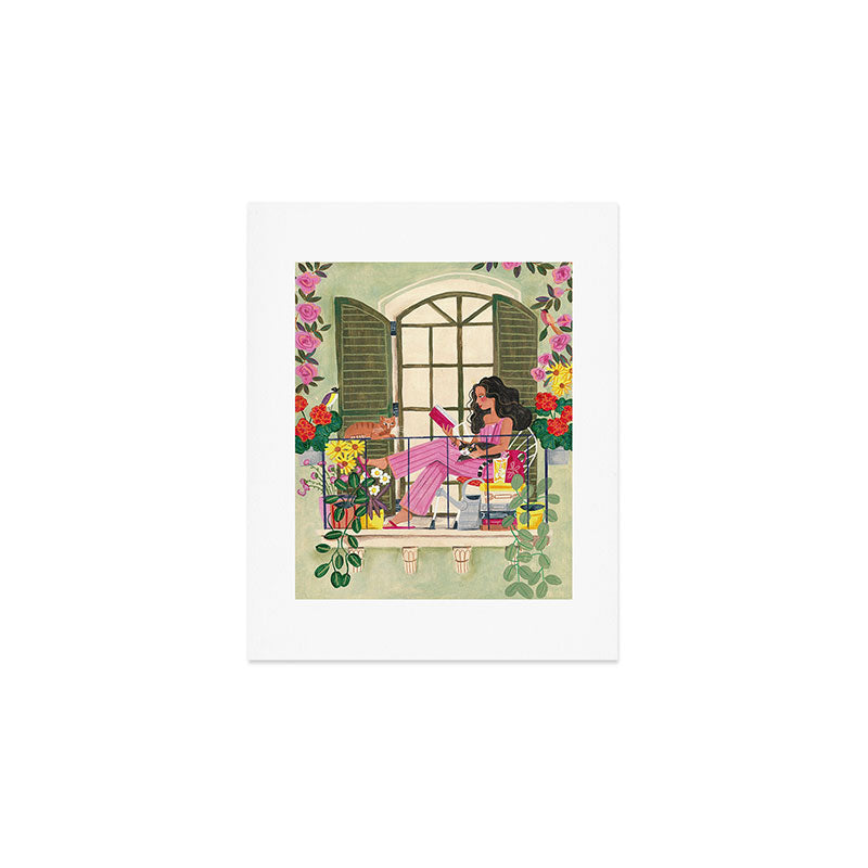 Woman reading on balcony Art Print Gallery Image 1