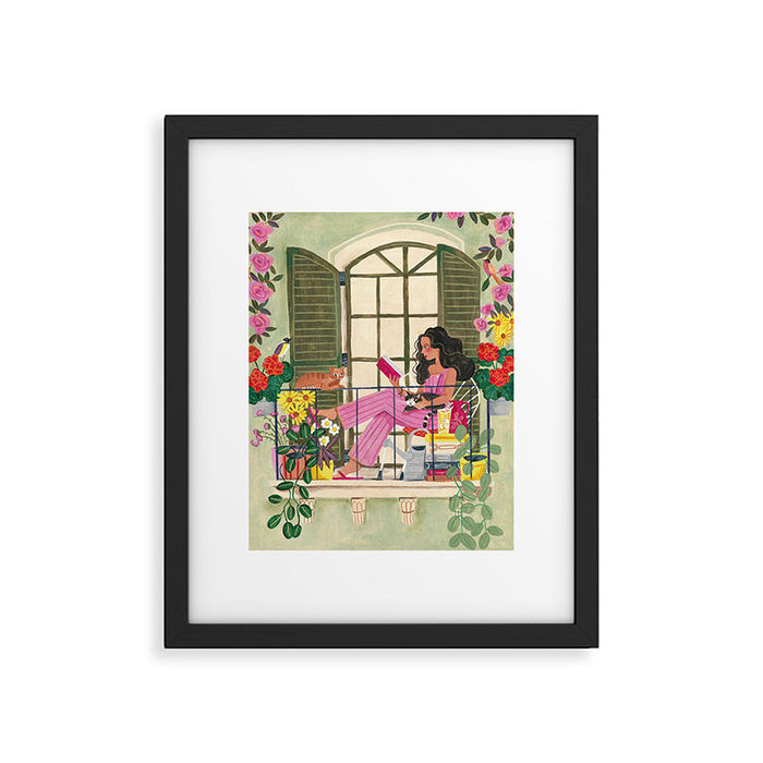 Woman reading on balcony Framed Art Print Gallery Image 1