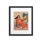 Woman with cat in living room in warm earth tones Framed Art Print Gallery Image 4