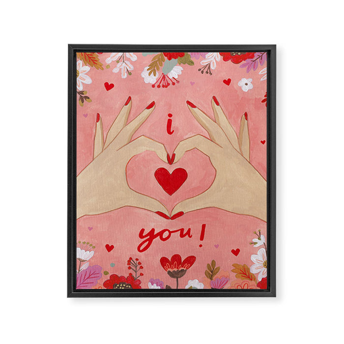 Women hands making love sign Framed Canvas Print Gallery Image 1