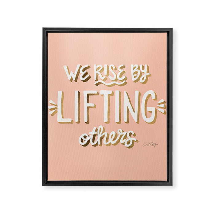 We Rise By Lifting Others - Blush & Gold Framed Canvas Print Gallery Image 1