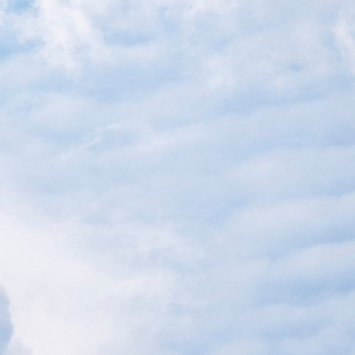 A pattern in the clouds in a blue sky on a summer day - dreamy clouds nature and travel photography Coffee Mug Gallery Image 2