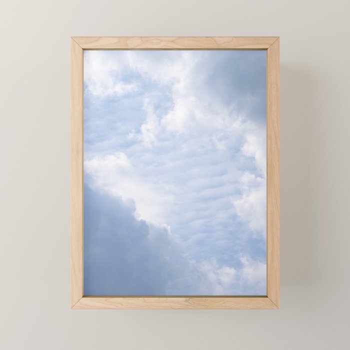 A pattern in the clouds in a blue sky on a summer day - dreamy clouds nature and travel photography Mini Art Print Gallery Image 1