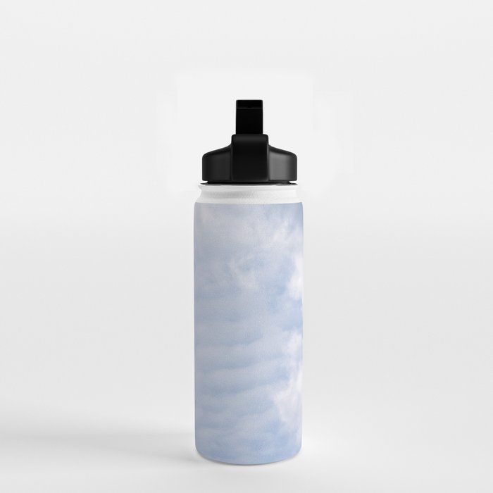 A pattern in the clouds in a blue sky on a summer day - dreamy clouds nature and travel photography Water Bottle Gallery Image 2