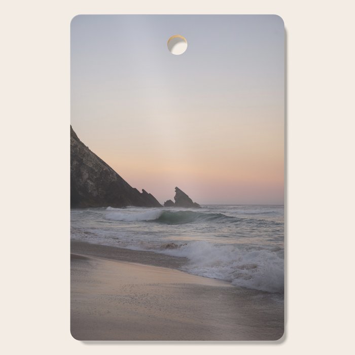 Pastel orange sunrise at Praia da Adraga in Portugal - summer coastal travel photography Cutting Board Gallery Image 1