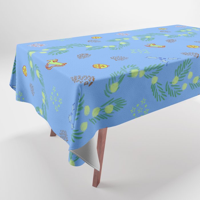 Whimsical Tiny Toys & Pine Branches in Blue Tablecloth Gallery Image 1