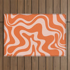 Retro Liquid Swirl Abstract Pattern in Orange and Pale Blush Pink Outdoor Rug Gallery Image 1