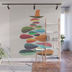 Bird nesting on top of pebbles hill Wall Mural Gallery Image 1