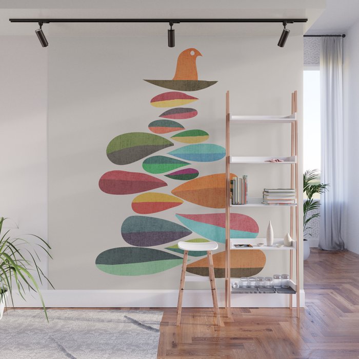 Bird nesting on top of pebbles hill Wall Mural Gallery Image 1