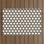 Star Tiles Geometric Pattern in Almond Cream and Black Outdoor Rug Gallery Image 1