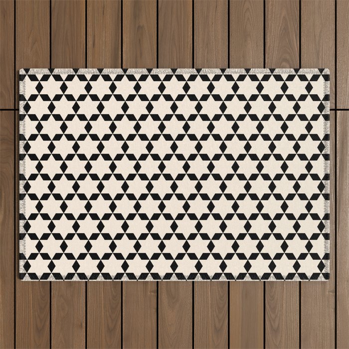 Star Tiles Geometric Pattern in Almond Cream and Black Outdoor Rug Gallery Image 1
