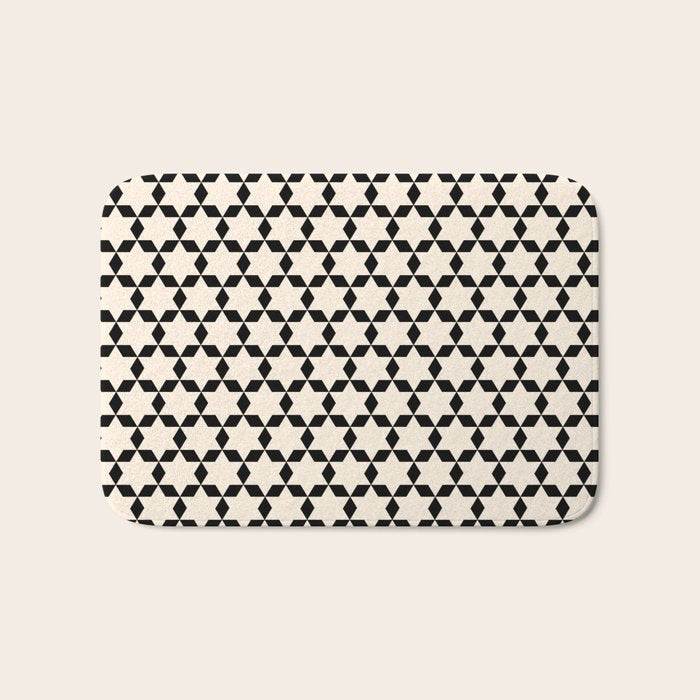 Star Tiles Geometric Pattern in Almond Cream and Black Bath Mat Gallery Image 1
