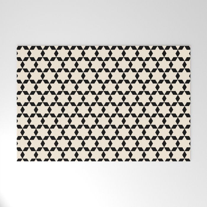 Star Tiles Geometric Pattern in Almond Cream and Black Welcome Mat Gallery Image 1